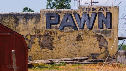 a picturesque pawnshop wall in arkansas