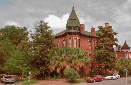 This is a picture of a lovely brick house to be found in Savannah Georgia