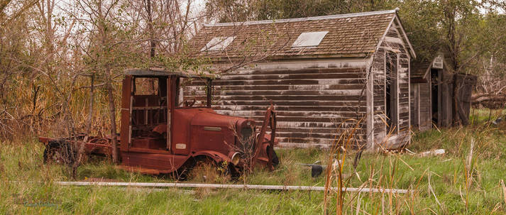 An old, rusted Ford truck