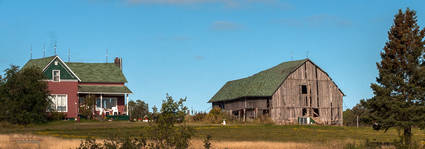 A house & Barn on a Hill