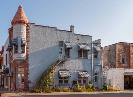 This building in Tipton Iowa has an interesting turret-like feature