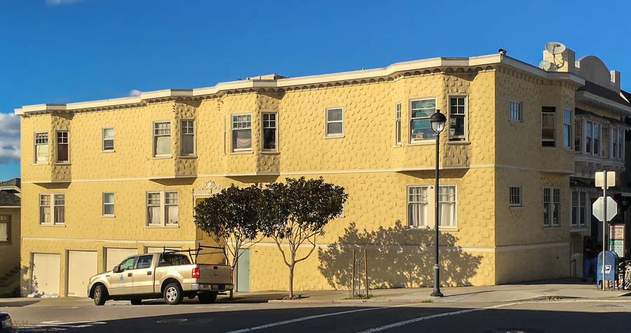 Yellow Stuccoed Apartment