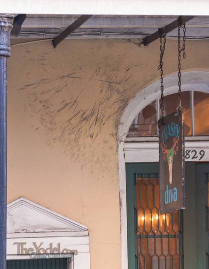 wind battered sign