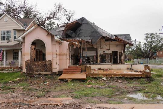 the house at the breach of the levee