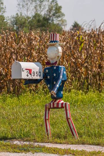 A creative mailbox made out of car parts