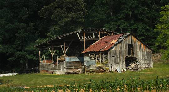 open-air shed with outbuilding