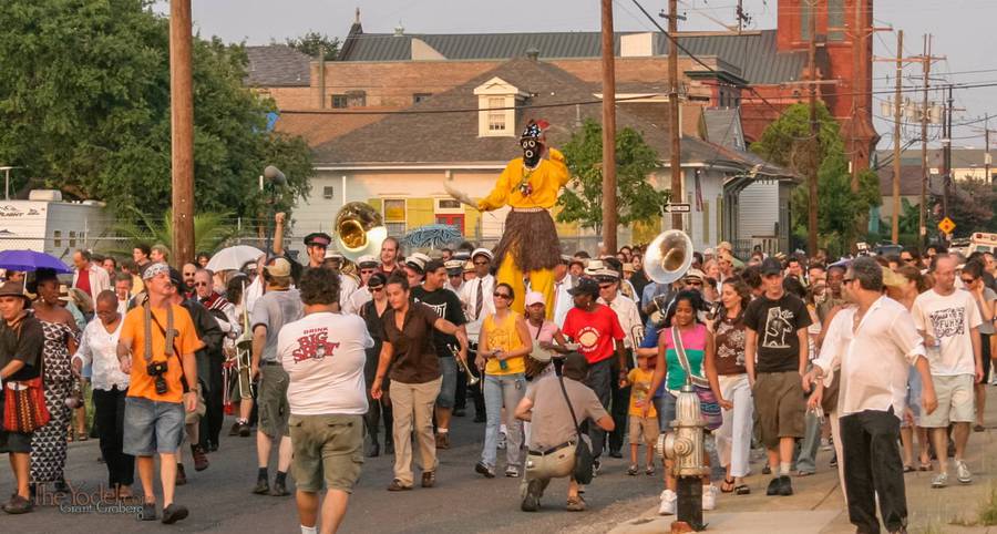 The parade moves down the street